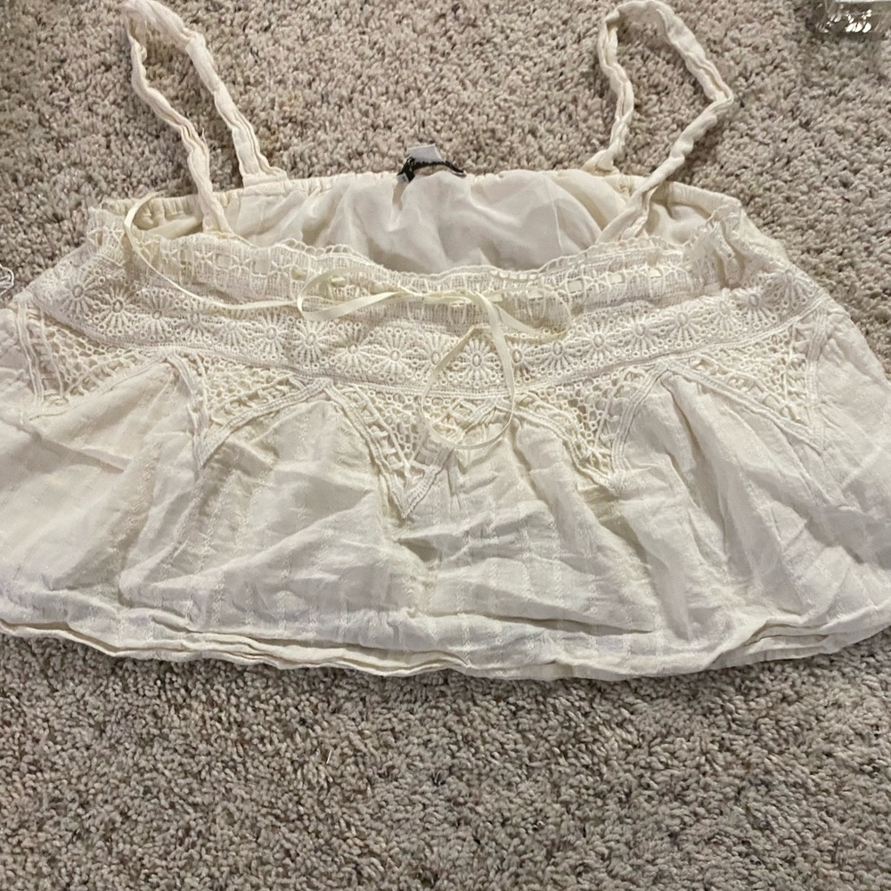 American eagle top! It’s super cute and is a virage style